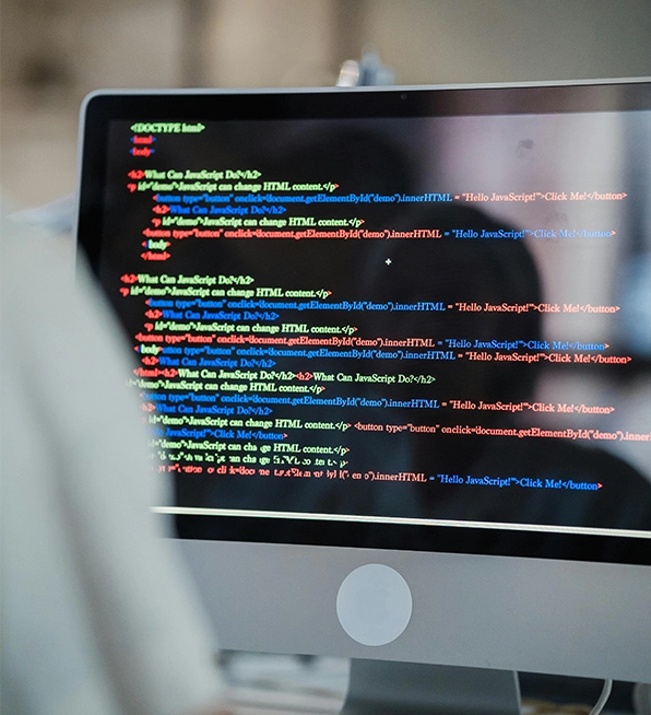 Computer screen displaying HTML and JavaScript code for a web application development project